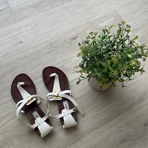 Steven Madden Flat Sandals in white and gold